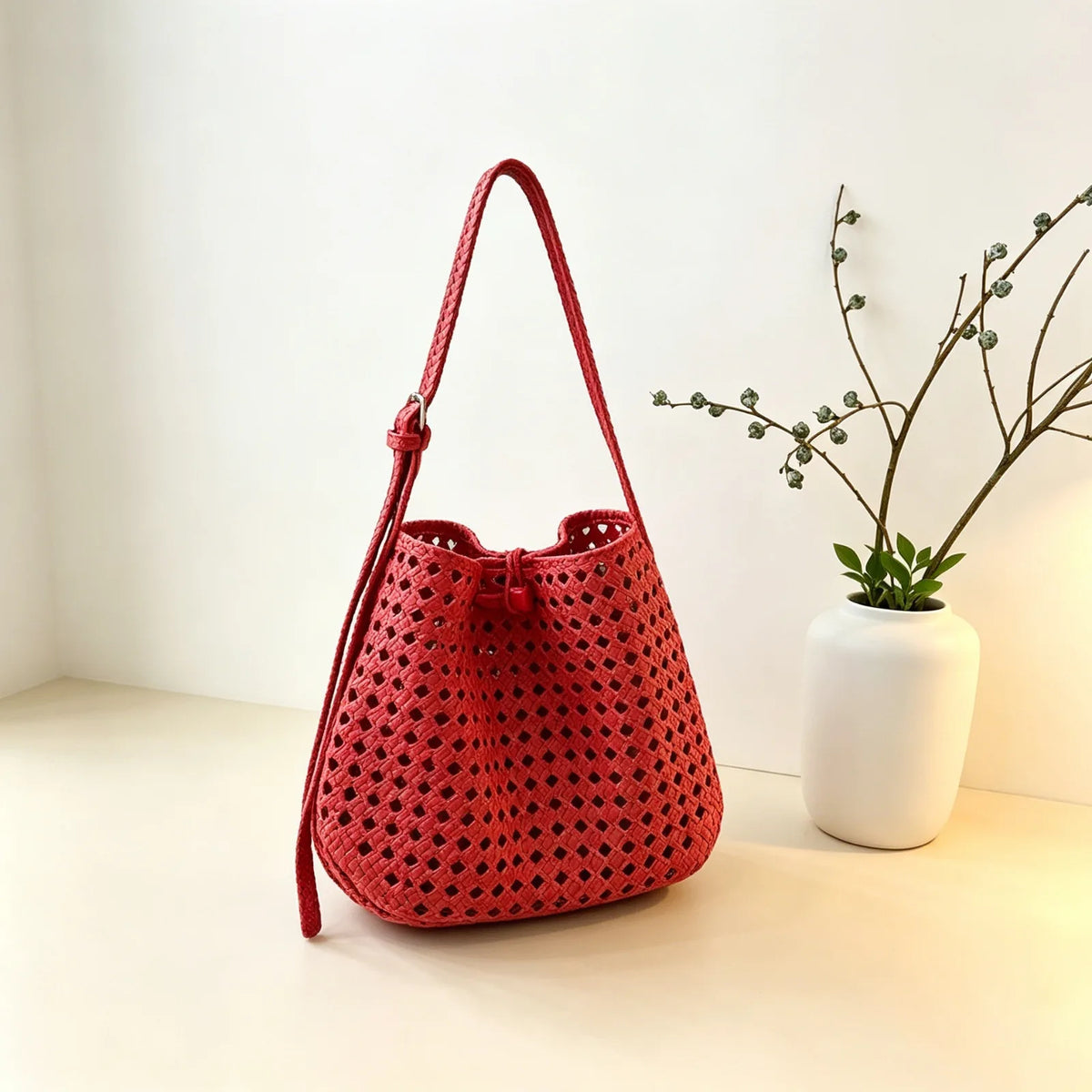 Hollow-out woven bucket bag for casual, beach-ready outings